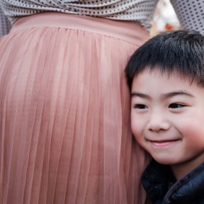 pregnant woman and child