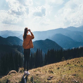Woman standing on mountain
