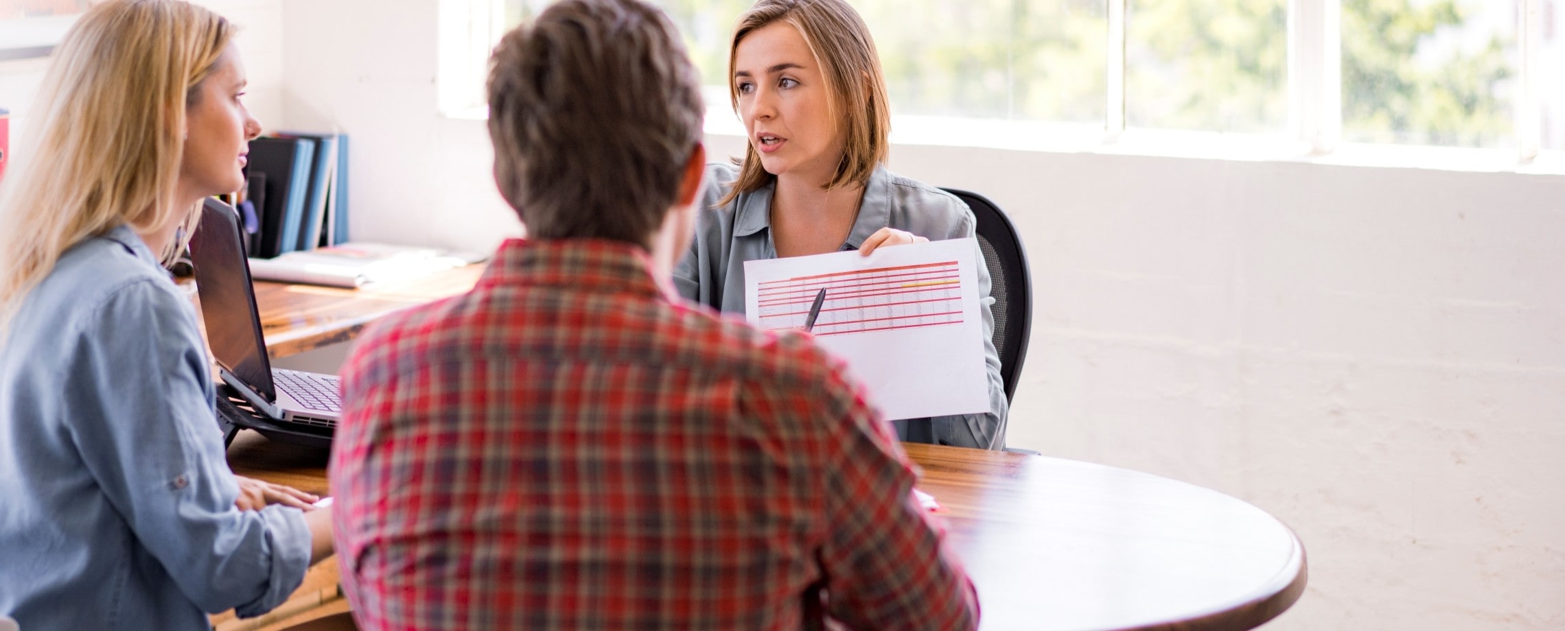 couple discussing with financial professional