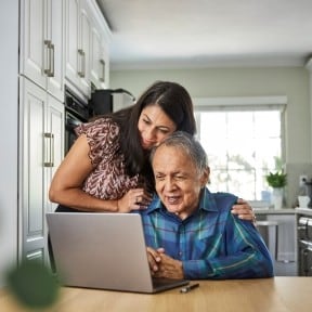 Daughter helping an aging father.