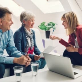 couple chatting with advisor