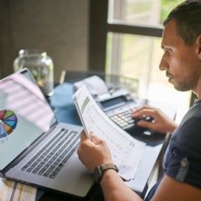 man doing taxes