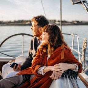 Couple on a sailboat.