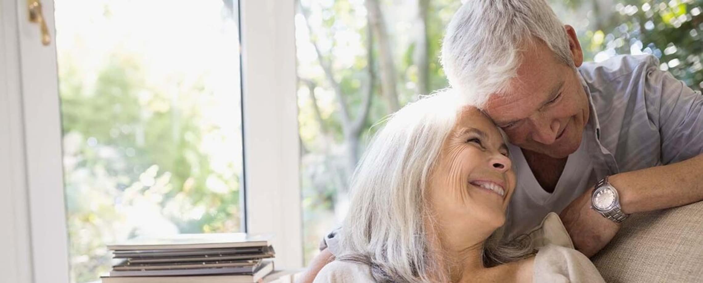 Older couple reviewing accounts.