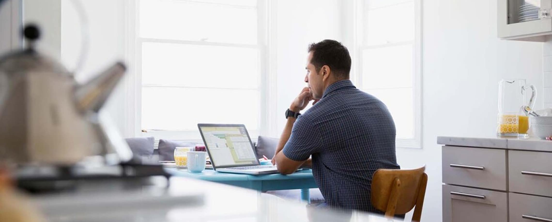 Man looking at laptop