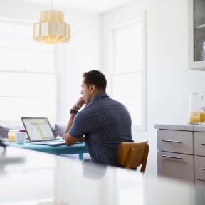 Man looking at laptop