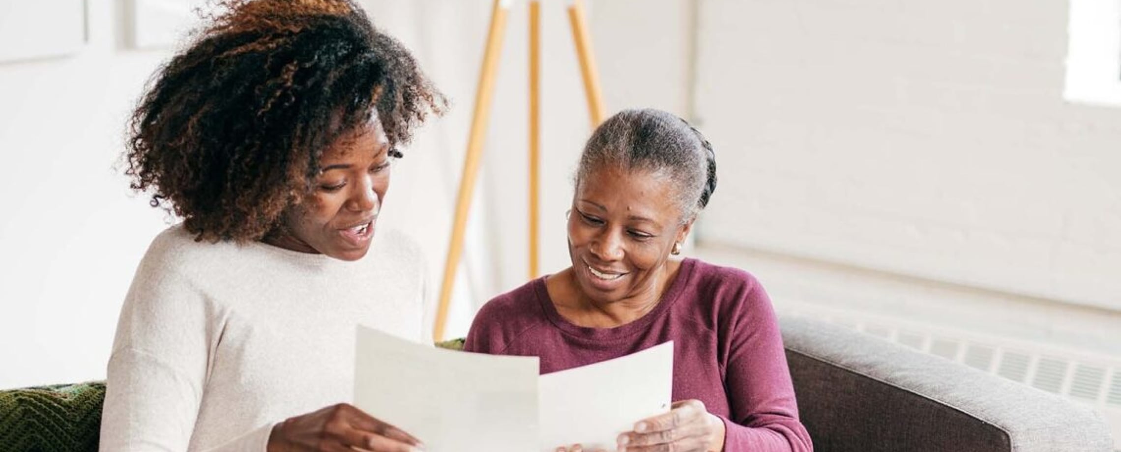 Mother and daughter reading form