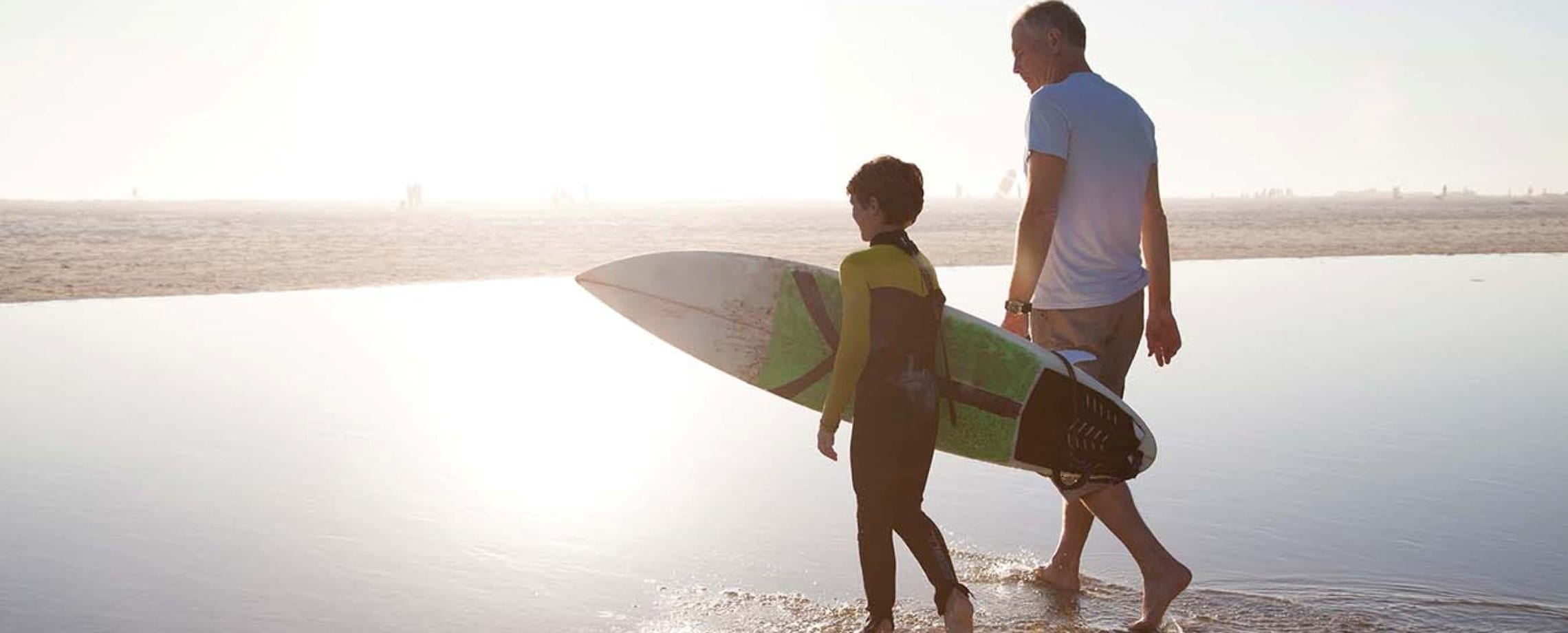 surfing kid and grand dad