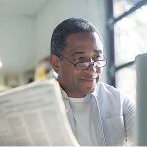 Man reading newspaper