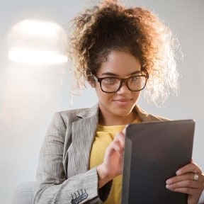 woman contemplating via tablet