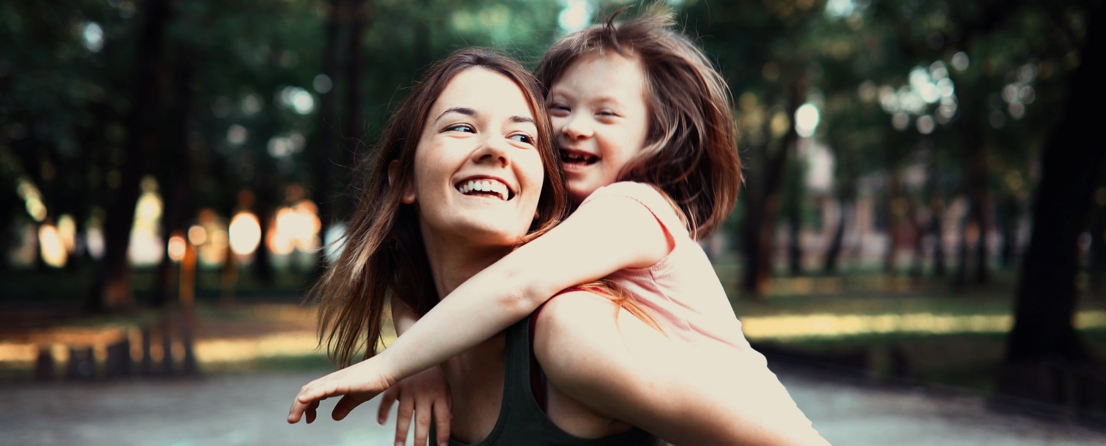 Mother playing with child with special needs. 