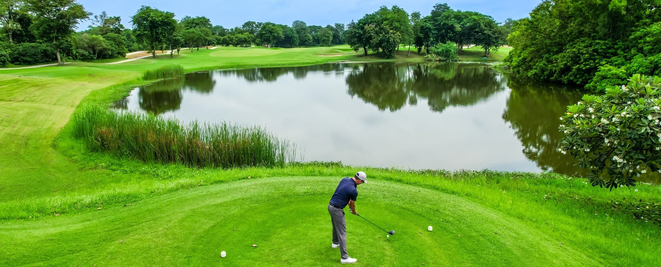 Man playing golf.