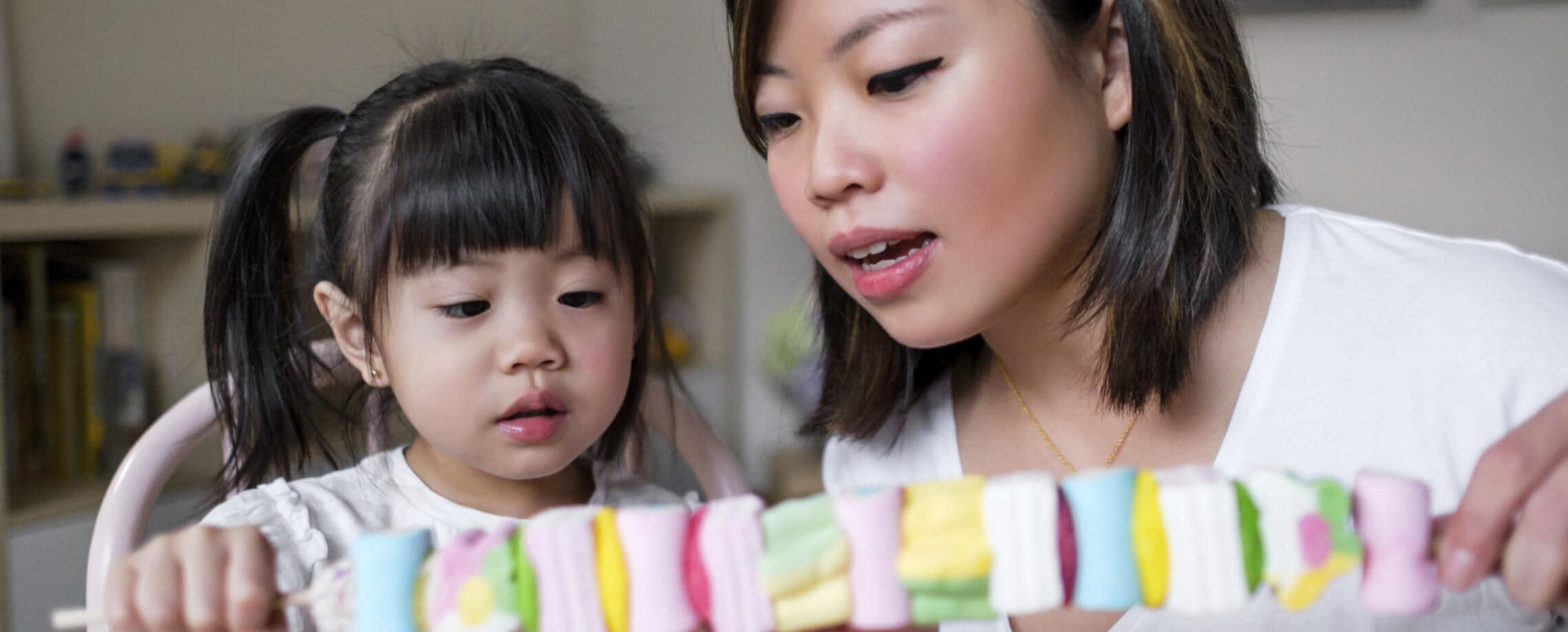 mother and daughter with candy