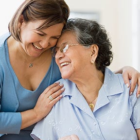 Two women sharing a hug