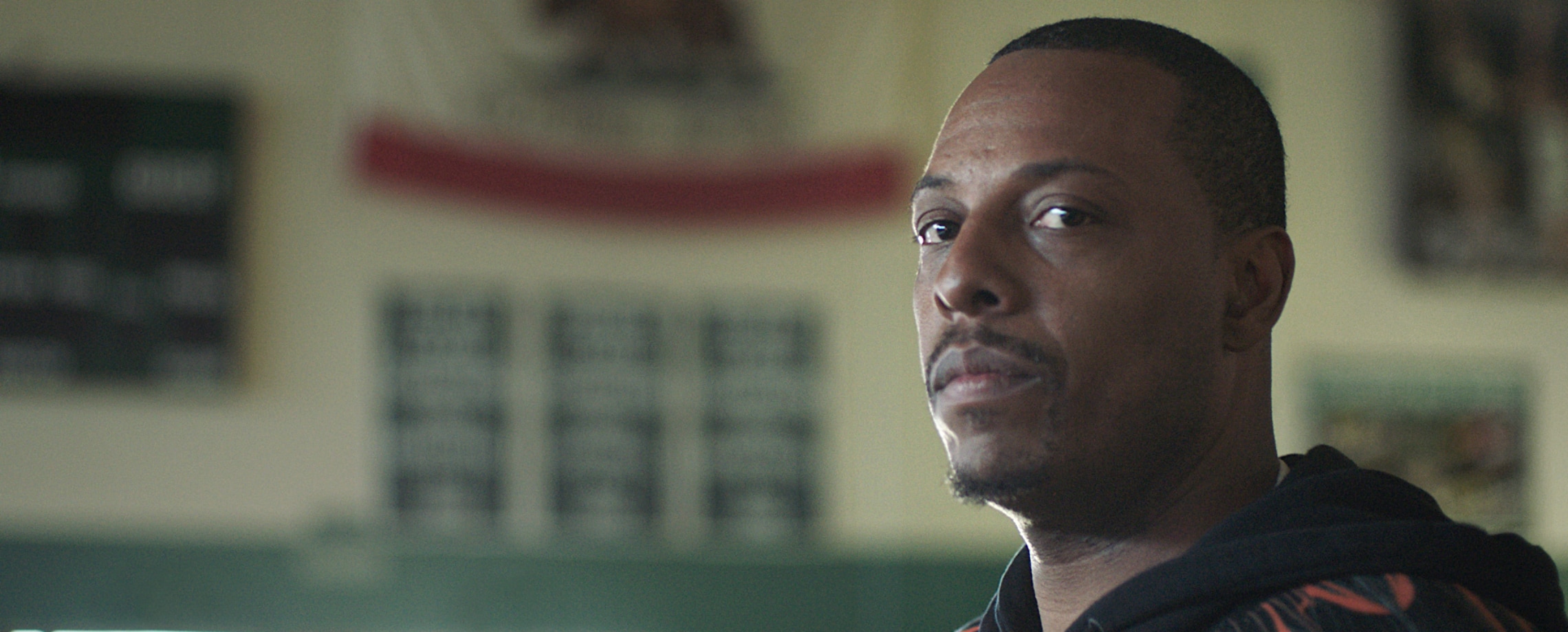 African-American man looking questioningly at camera