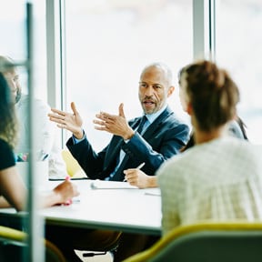 African-American businessman talking in a meeting