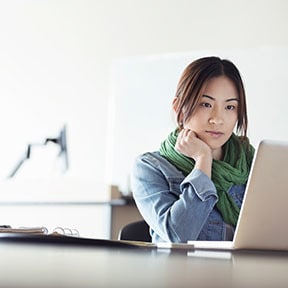 woman contemplates
