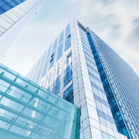 Low-angle view of a glass office building