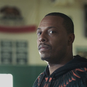 African-American man looking questioningly at camera
